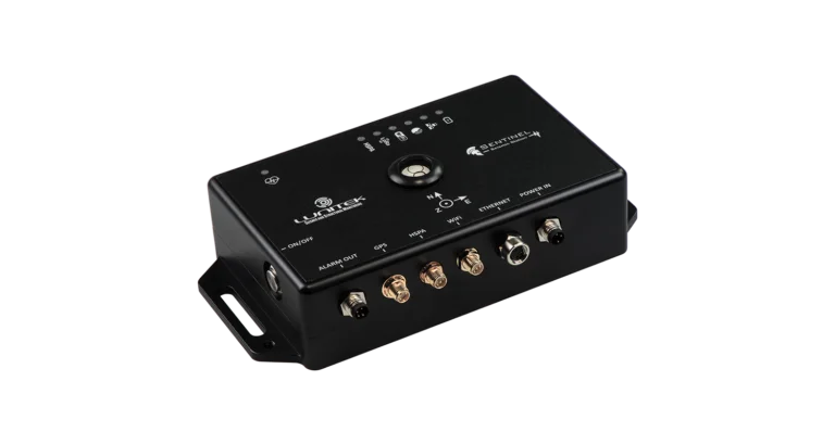 SENTINEL high-precision triaxial MEMS accelerograph and seismic recorder featuring a rugged anodized aluminum casing and adjustable leveling mounting plate.