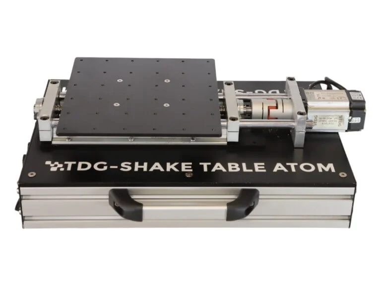 A CE-certified ATOM-25 portable earthquake simulation table used with EasyTest software for accelerometer calibration and civil engineering research.