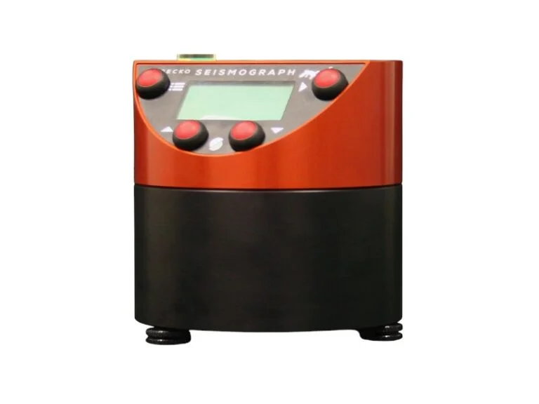 Gecko SMA compact triaxial strong motion accelerograph with an on-site LCD configuration screen and keypad, designed for seismic and structural blast monitoring.