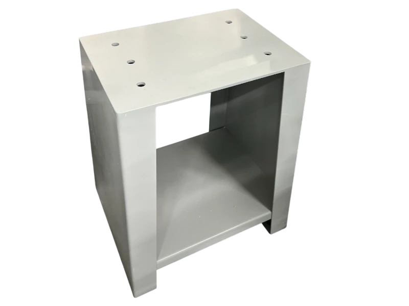 An industrial machine-gray fully welded steel stand featuring pre-drilled top mounting holes, built as a vibration-resistant platform for laboratory shake table testing.